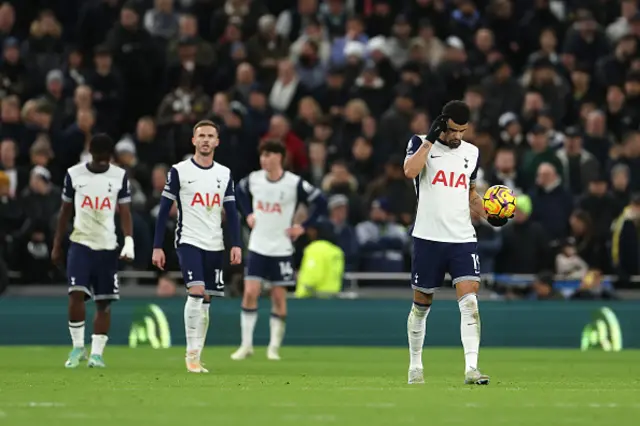 Dominic Solanke of Tottenham Hotspur shows dejection after Luis Diaz's goal