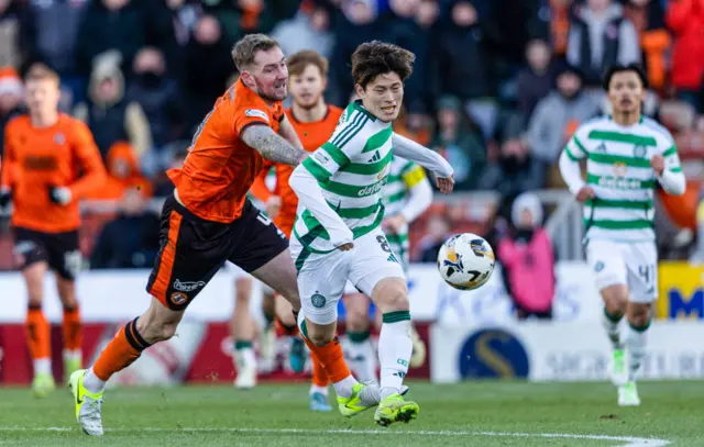 Kevin Holt keeps an eye on Celtic striker Kyogo