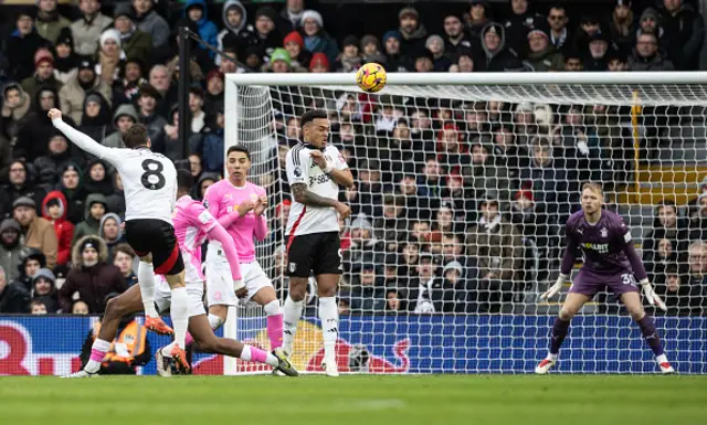 Fulham's Harry Wilson (left) shoots at goal