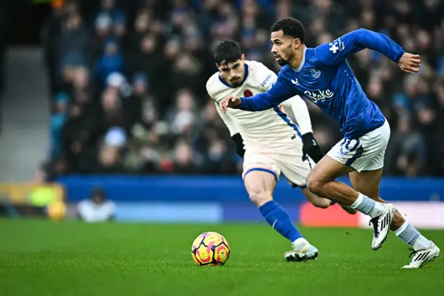 Pedro Neto(rear R) fights for the ball with Everton's Senegalese striker #10 Iliman Ndiaye