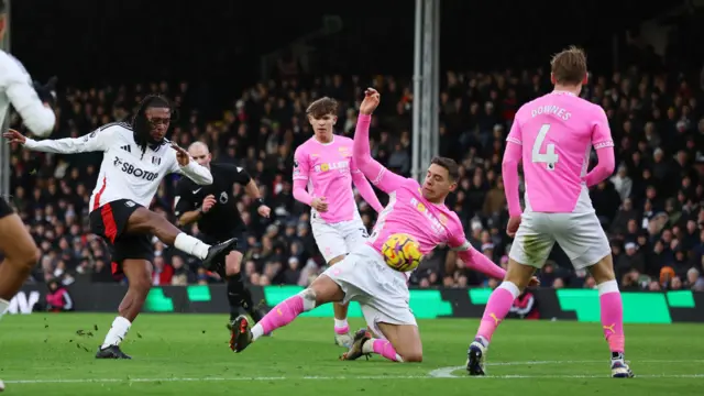 Fulham's Alex Iwobi shoots at goal