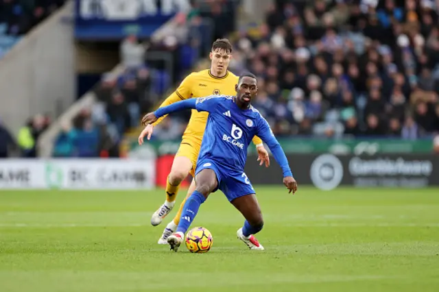 Boubakary Soumare of Leicester City in action with Jörgen Strand Larsen