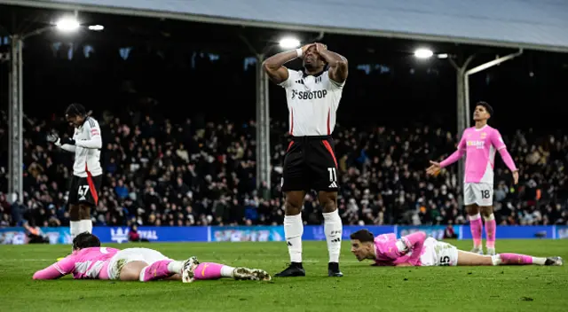 Fulham's Adama Traore (centre) rues a near miss