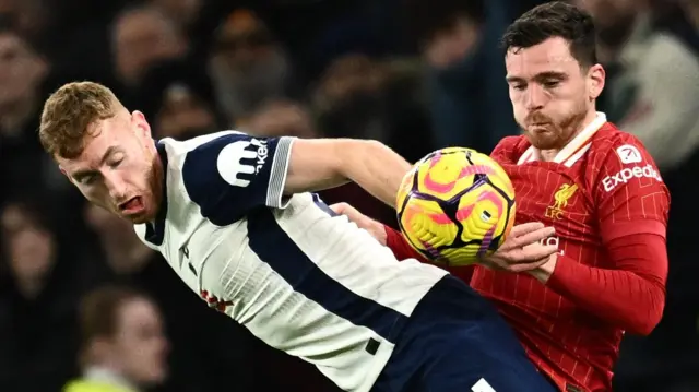 Tottenham Hotspur's Dejan Kulusevski in action with Liverpool's Andrew Robertson