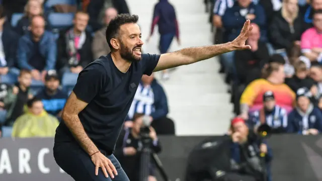 West Brom boss Carlos Corberan on the touchline during a game