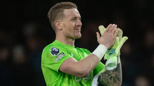 Jordan Pickford applauds fans after keeping another clean sheet