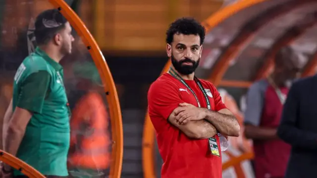 Mohamed Salah looks on while injured at the Africa Cup of Nations