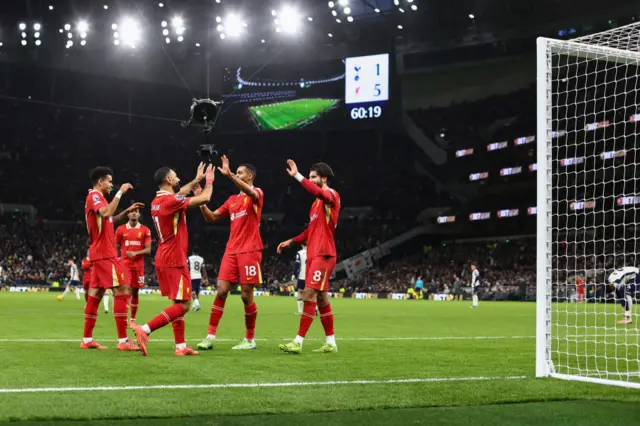 Liverpool celebrating their fifth goal against Tottenham