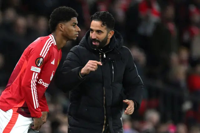 Ruben Amorim talking to Marcus Rashford