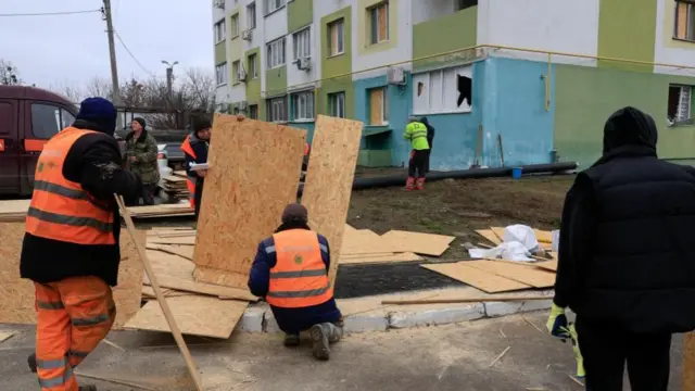 An apartment block being repaired in Kharkiv earlier