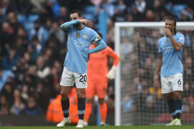 Manchester City look dejected