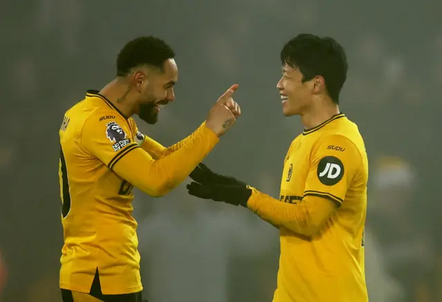 Wolverhampton Wanderers' Hwang Hee-chan celebrates scoring their second goal with Matheus Cunha