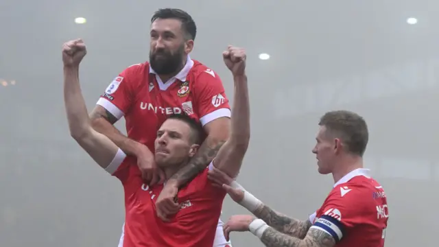 Wrexham celebrate with Paul Mullin