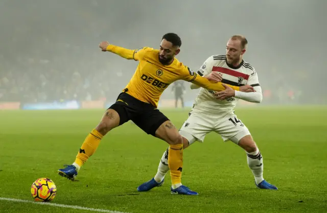 Wolverhampton Wanderers' Matheus Cunha and Manchester United's Christian Eriksen battle for the ball