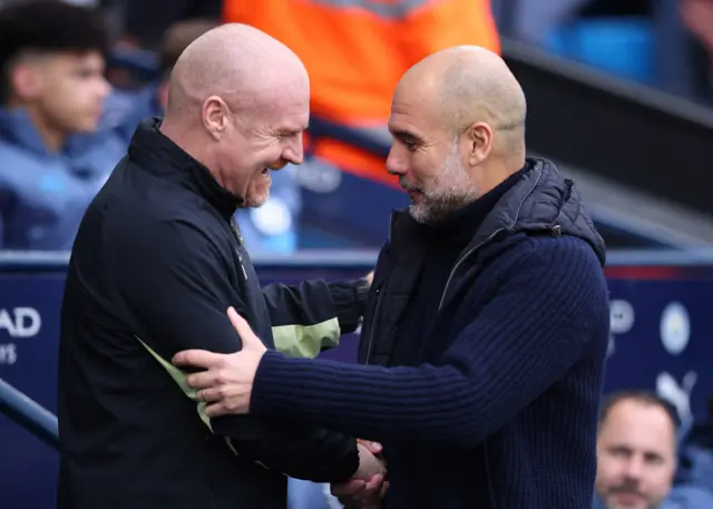 Sean Dyche and Pep Guardiola