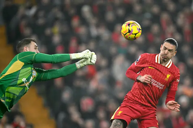 Darwin Nunez reacts as Leicester City's Polish goalkeeper Jakub Stolarczyk punches the ball