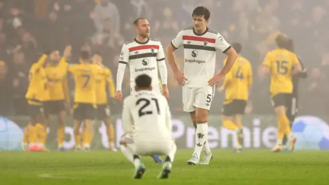 Harry Maguire of Manchester United reacts following Wolverhampton Wanderers' second goal