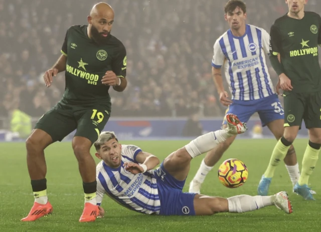 Brighton and Hove Albion's Julio Enciso lies on the floor