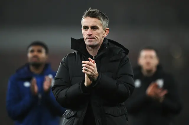 Kieran McKenna, Manager of Ipswich Town, applauds the fans