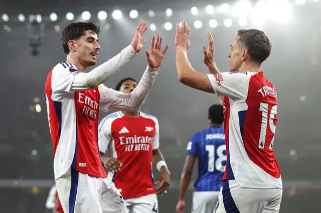 Kai Havertz of Arsenal celebrates scoring the opening goal with Leandro Trossard