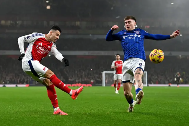 Gabriel Martinelli battles for the ball