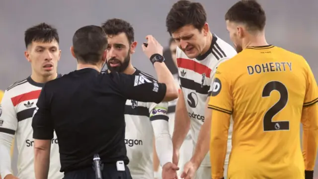 Bruno Fernandes protests after being sent off in Thursday's defeat at Wolves