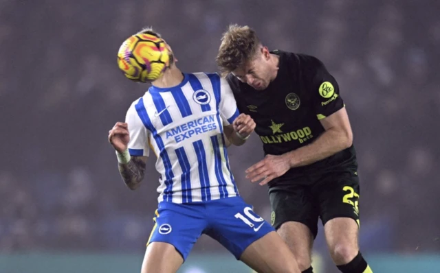 Brentford's Nathan Collins in action with Brighton & Hove Albion's Julio Enciso