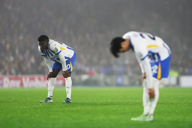 Carlos Baleba of Brighton & Hove Albion (L) reacts