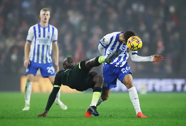 Yoane Wissa of Brentford and Yasin Ayari of Brighton & Hove Albion battle for possession