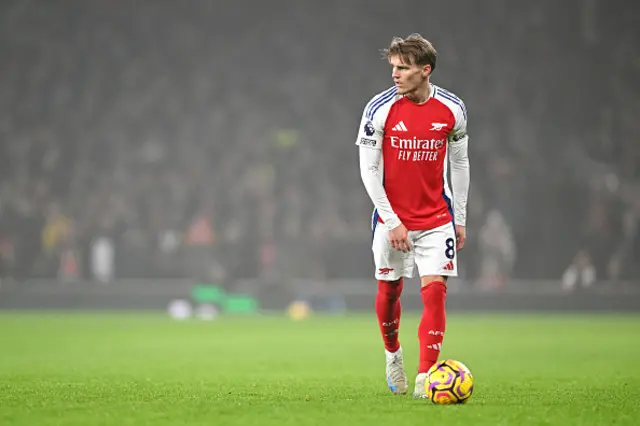 Martin Odegaard of Arsenal looks on