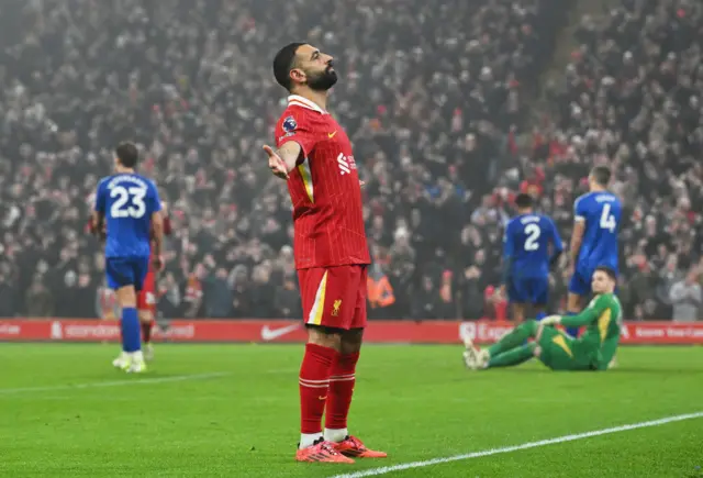 Mohamed Salah celebrates scoring against Leicester