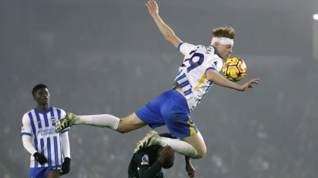 Brighton & Hove Albion's Jan Paul van Hecke in action with Brentford's Yoane Wissa