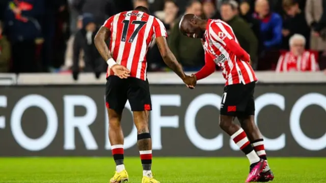 Ivan Toney of Brentford celebrates scoring the opening goal with teammate Yoane Wissa