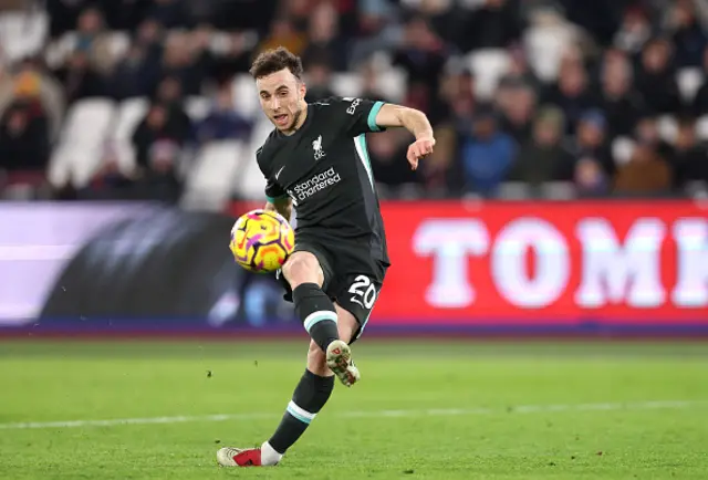 Diogo Jota of Liverpool scores