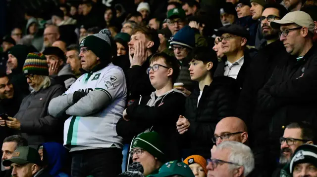 Plymouth fans in the stands at the Kassam Stadium