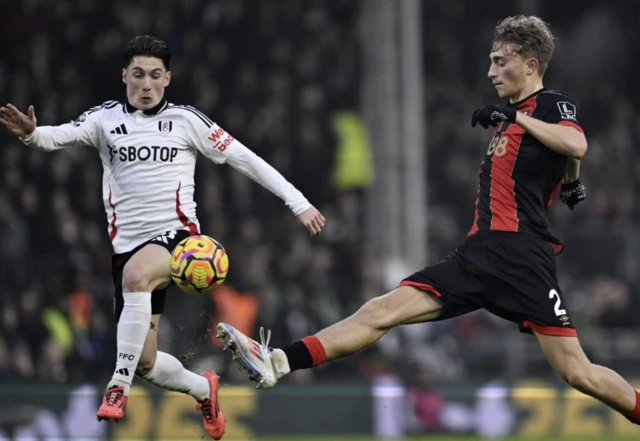 AFC Bournemouth's Dean Huijsen in action with Fulham's Harry Wilson