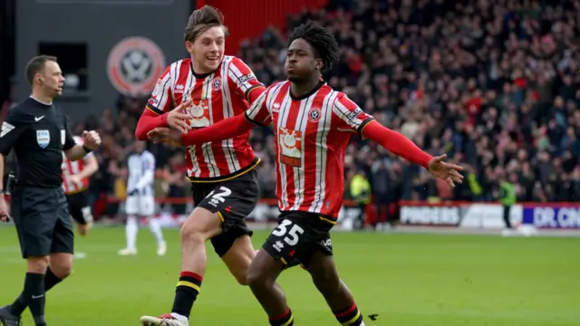 Andre Brooks celebrates opening the scoring for Sheffield United against West Brom