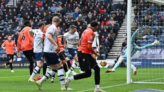 Emil Riis opens the scoring for Preston from close range