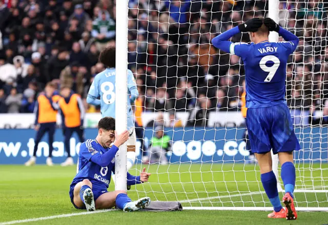 Facundo Buonanotte and Jamie Vardy of Leicester City react