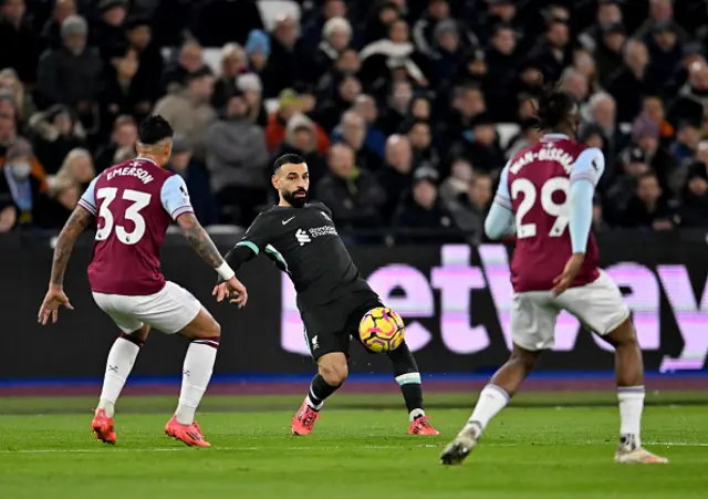 Mohamed Salah of Liverpool controls the ball