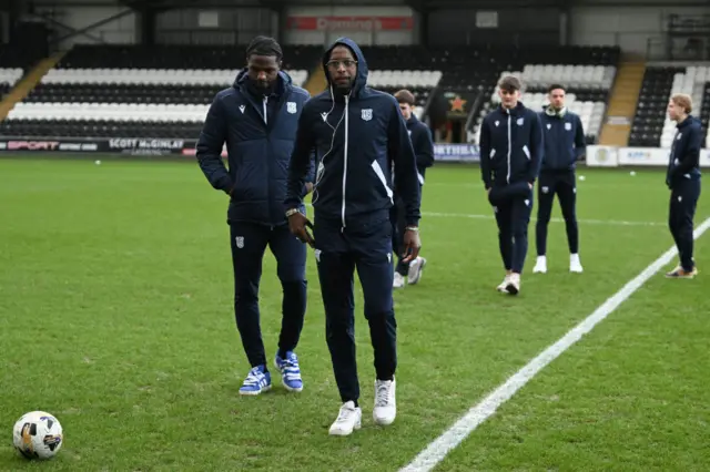 Dundee players check out the Paisley turf