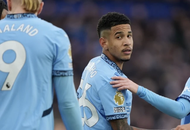 Manchester City's Savinho (centre right) celebrates