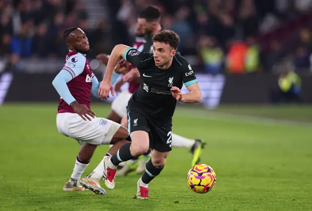 Diogo Jota of Liverpool runs with the ball