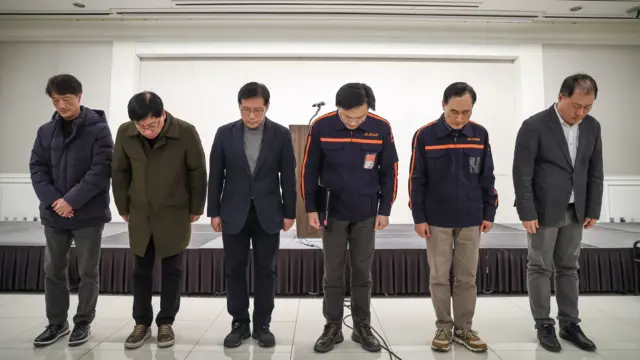 Jeju Air CEO Kim E-bae (C-R) and other company officials express their apologies ahead of a press conference held in Seoul, South Korea, 29 December 2024, hours after the deadly crash of one of its flights at Muan International Airport in Muan, 288 kilometers southwest of Seoul.