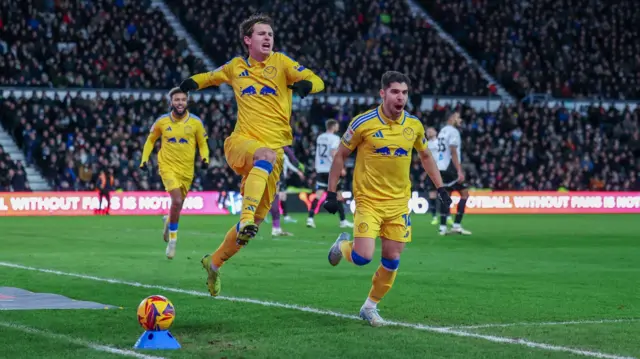 Brenden Aaronson celebrates scoring for Leeds at Derby