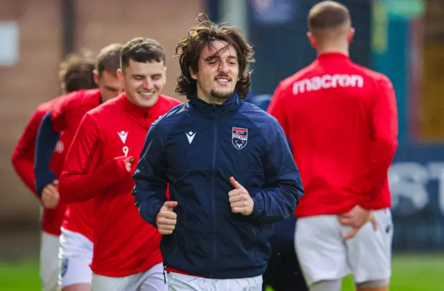 Ross County's James Brown warms up