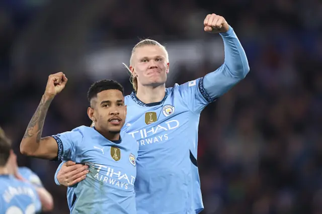 Erling Haaland (R) celebrates with Manchester City's Brazilian midfielder #26 Savinho