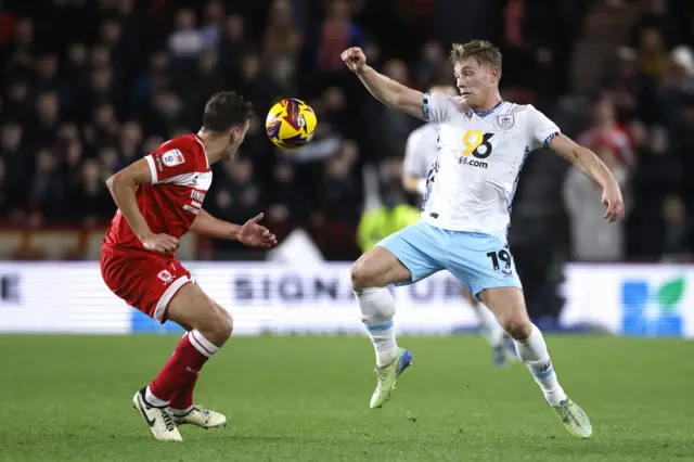 Burnley's Zian Flemming takes on Dael Fry