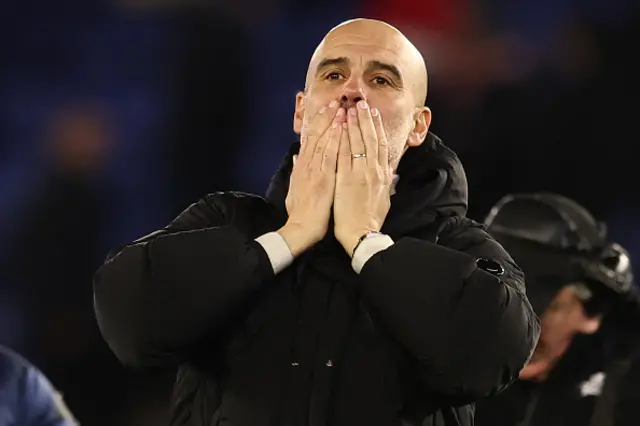 Manchester City's Spanish manager Pep Guardiola reacts on the pitch