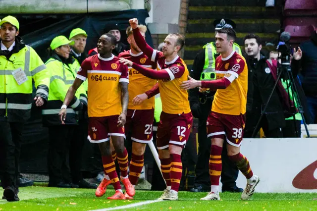 Motherwell players celebrate at Fir Park